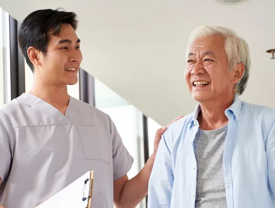 Physical therapist guiding a patient through a one-on-one session