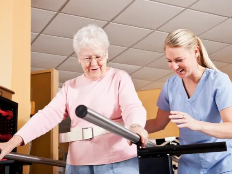 Physical therapist assessing a patient's balance and walking pattern