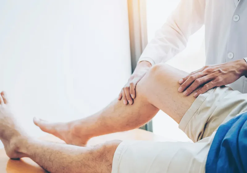 Physical therapist performing active release technique
