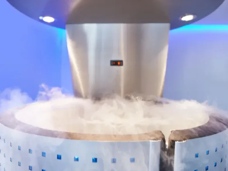 Cryotherapy cold pack being applied to a patient's shoulder during a treatment session